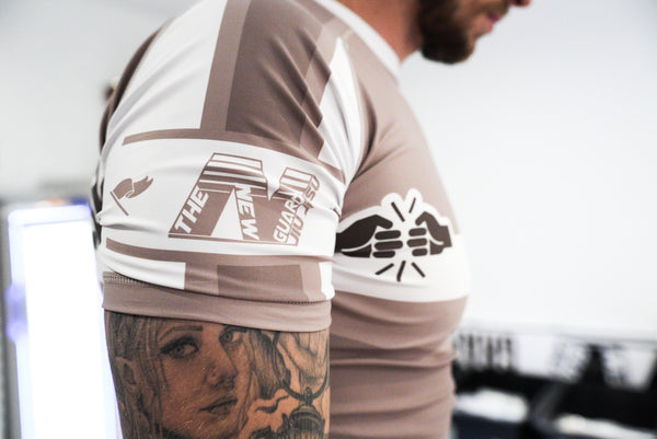 BELTS AREN’T REAL RASHGUARD V1 - BROWN